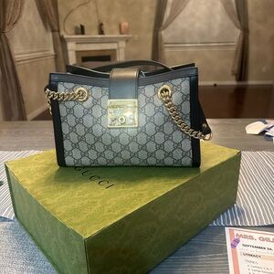 Gucci bag. Slightly new. Slight scraches on the lock.